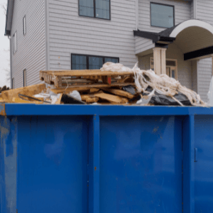 residential dumpster rental Kennesaw - 5 Tips For Renting A Dumpster For Your Move - a dumpster full of demolished materials from a renovation
