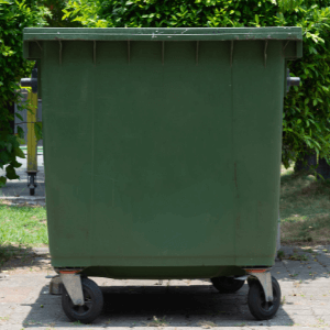 dumpster near me - a green dumpster that appears to be empty